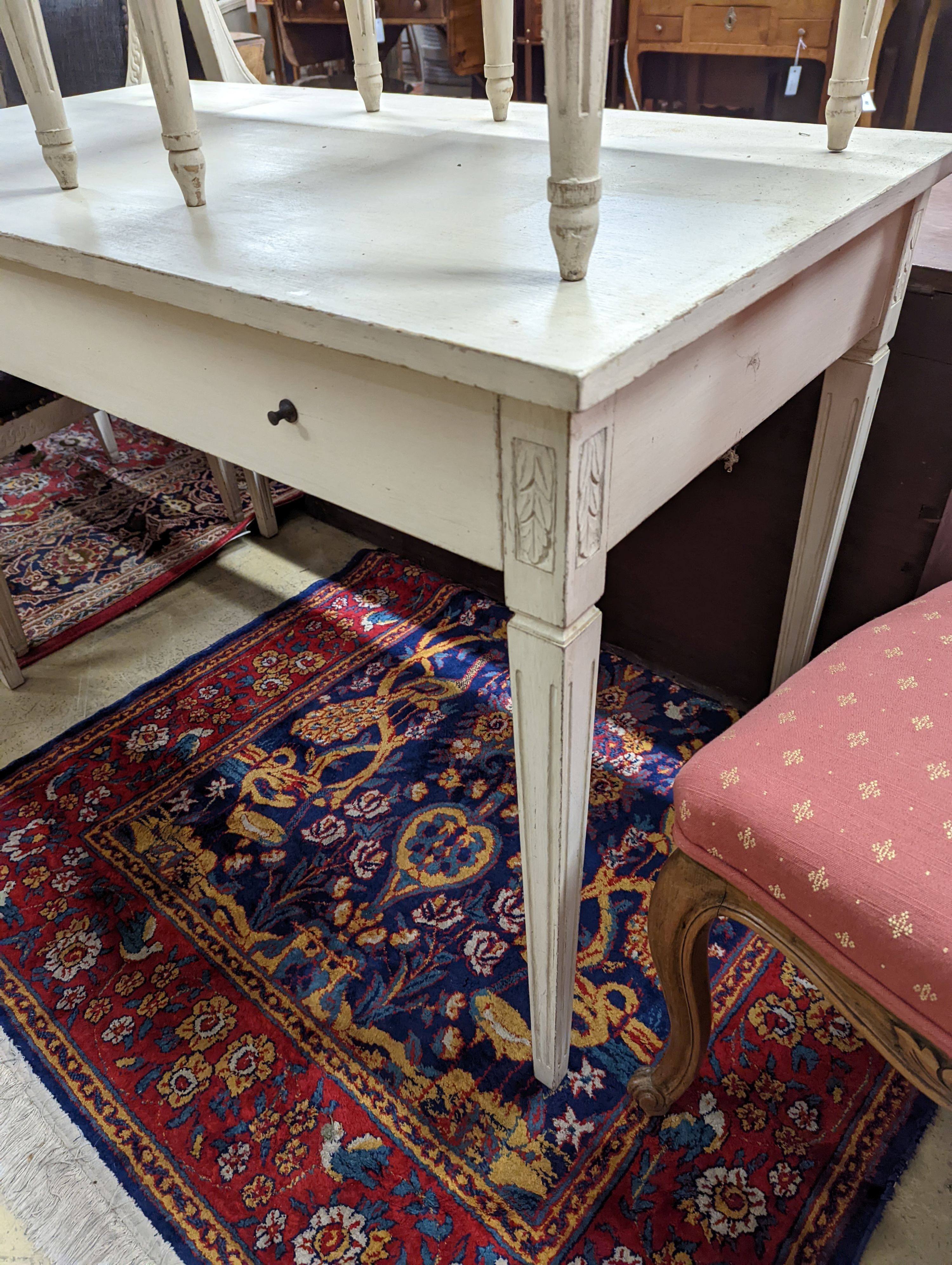 A rectangular painted dressing table, width 110cm, depth 60cm, height 75cm, together with two painted dressing stools